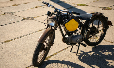 Retro moped in the parking lot.