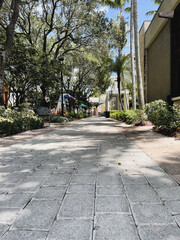 stone walkway path through shops business background image 