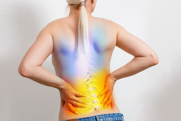 Doctor examines the problem of the appearance of lower back pain on a virtual screen