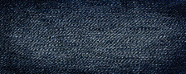 dark blue worn denim fabric, top view, textile background