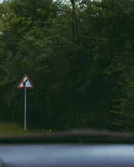 Road sign in the forest