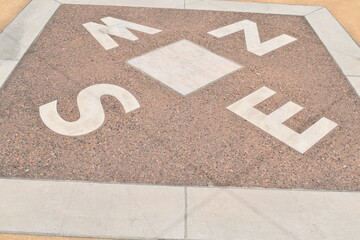 Compass Design on a Sidewalk