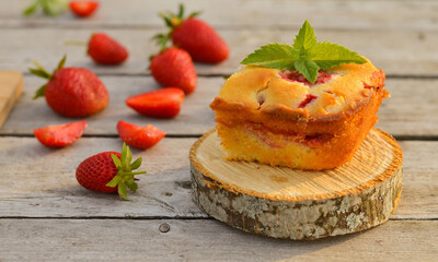 Delicious summer dessert strawberry pie, sweet delicious festive cake with strawberries on a round stand