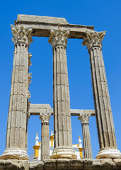 The Roman Temple of Evora, also called the Temple of Diana. Behind it, The Cathedral of Evora....