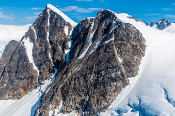 An aerial view of the rugged mountain peaks above the Denver glacier close to Skagway, Alaska in...
