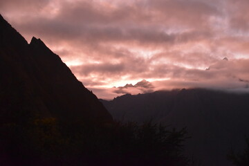 The purple and pastel colors on the sky during sunset in the mountains of Peru
