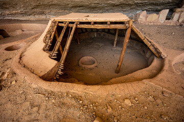 Kiva Roof Reconstructed with log and dirt ceiling