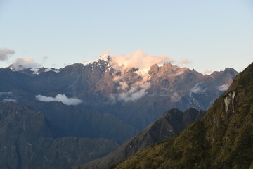 Beautiful sunset in purple and orange over the Salcantay snowy mountain top in Peru