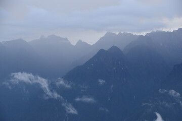 Hiking in the beautiful lush green cloud forests and Andes Mountains on the Inca Trail in Peru