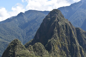 Hiking in the beautiful lush green cloud forests and Andes Mountains on the Inca Trail in Peru