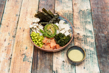 Modern poke consists of diced yellowfin tuna, marinated with Hawaiian sea salt, a small amount of...