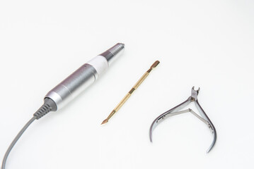 Utensils, lathe, tweezers and nail clippers in a beauty salon