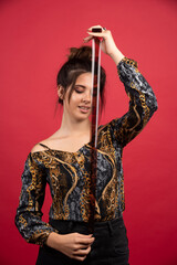 Brunette girl checks her photo history on polaroid film