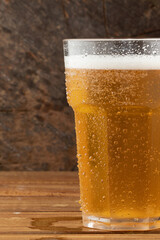 A cup of cold beer. Copy space .