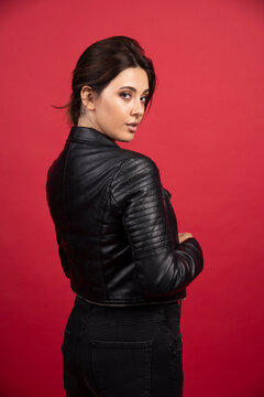 Cool Girl In Black Leather Jacket Gives Seductive Poses