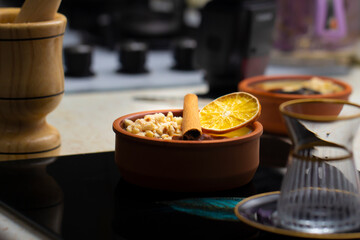Rice pudding in the oven and a cup of tea. still life photography