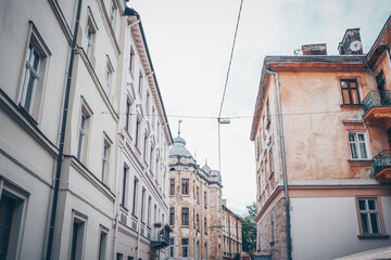 Facades of houses in Lviv, old buildings against the sky