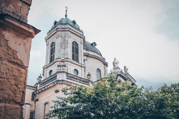 Facade of houses in Lviv, church and historical building