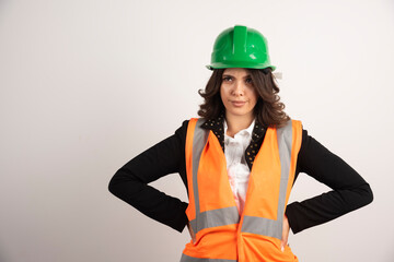 Portrait of woman engineer on white background