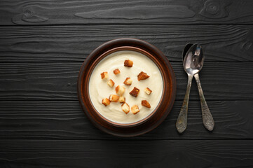 Creamy cauliflower soup with homemade croutons.