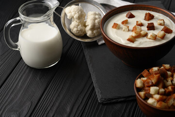 Creamy cauliflower soup with homemade croutons.