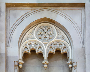 Pertevniyal Valide Sultan Mosque (also known as Aksaray Valide Mosque) in Laleli, Istanbul, Turkey. Ottoman mosque in gothic style. Close up view of marble decorative arch. Art or architecture concept
