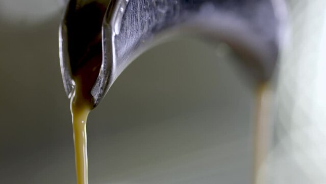 Pouring Coffee Into Cup close up