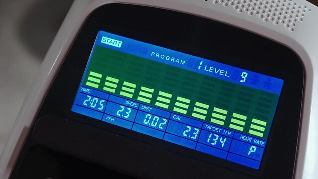closeup of treadmill control panel with electronic screen for sport exercise