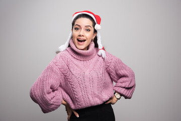 Happy young girl hands on hip