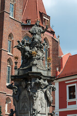 Fototapeta premium Fountain near the Cathedral of John the Baptist in Wroclaw on Tumsky Island. Historical and tourist attractions in Poland