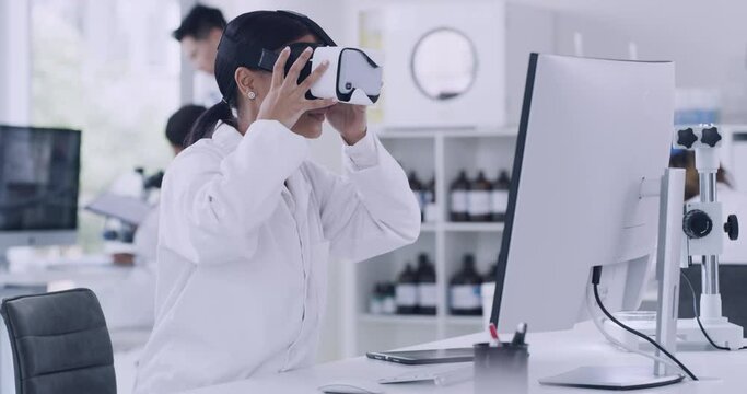 Scientist using virtual reality goggles to examine medical research experiment in 3D. Pathologist, biochemical engineer working in laboratory and using vr metaverse technology to explore DNA genetics