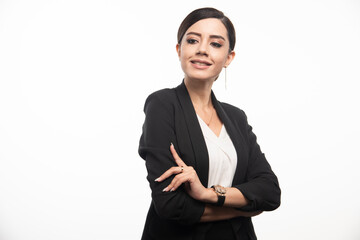 Happy businesswoman posing on white background