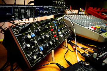 The surface with sliders of a sound mixer controller