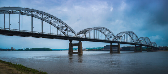 Centennial Bridge and dramatic cloudscape over the Mississippi River, the view from Centennial Park in Davenport, Iowa