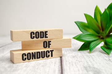 Code of conduct symbol. Concept words Code of conduct on wooden blocks on white background