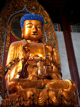 New Age Buddhism.  Photographic interpretation of ancient Buddhist statue in light of Internet depictions.