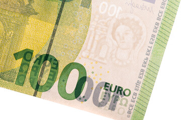 Fragment of a banknote in denomination of 100 euros on a white background