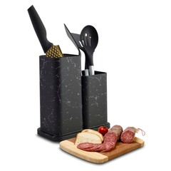stand for kitchen utensils with spoons and a knife on a white background next to a sliced...