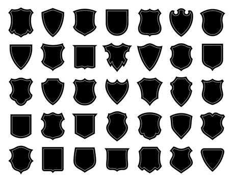 Shields set. Collection of security shield icons with contours. Police badge shape. Insignia silhouettes. Security, football patches vector. Coat of arms icon set. Template isolated. logo design