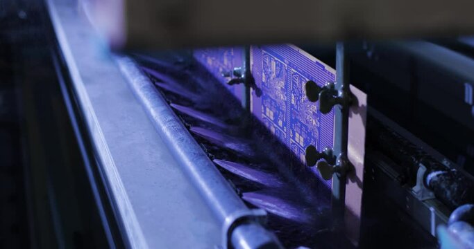 Testing machine with special fluid. Automatic testing of electronic circuit boards, in a modern laboratory. Manufacturing of microcircuits and microprocessors. Production of microelectronic equipment.