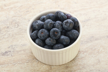 Sweet ripe blueberry heap in the bowl