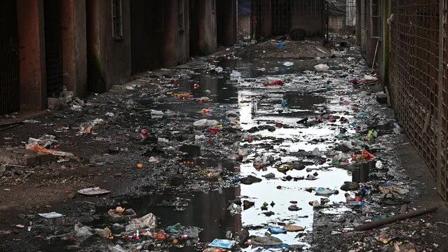 Dirty Garbage underline in ally of buildings in chawl system buildings, mumbai city, India.