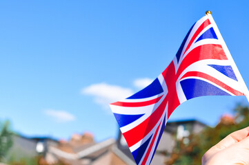 union jack flag on blue sky background 