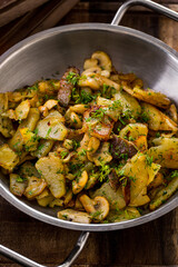 Fried potatoes with herbs