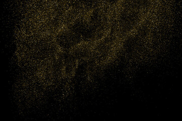 Gold Glitter Texture Isolated on Black Background. Golden stardust. Amber Particles Color. Sparkles Rain. Vector Illustration, Eps 10.