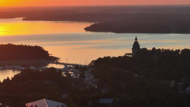 Aerial view of silhouette of Naantali, Finland in summer sunset
