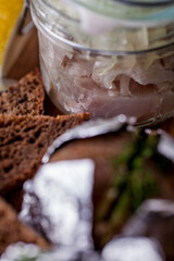 Snack with vodka from potatoes and herring