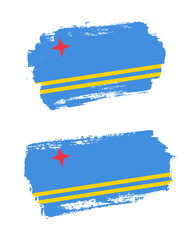 Set of two creative brush painted flags of Aruba country with solid background