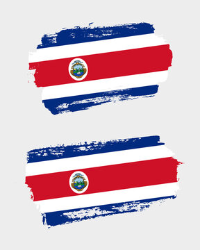Set of two creative brush painted flags of Costa Rica country with solid background
