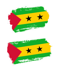 Set of two creative brush painted flags of Sao Tome and Principe country with solid background